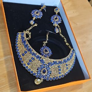Luxurious Gold and Blue Necklace Set, And Skirt.